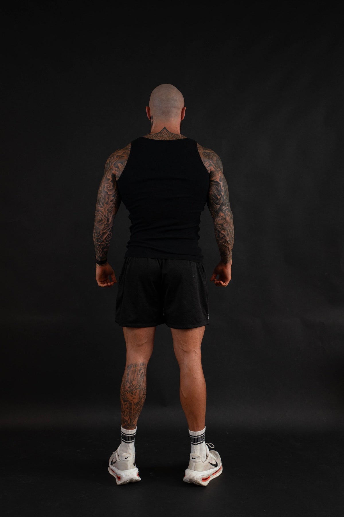 Grit Beater in Black, back view on a male model
