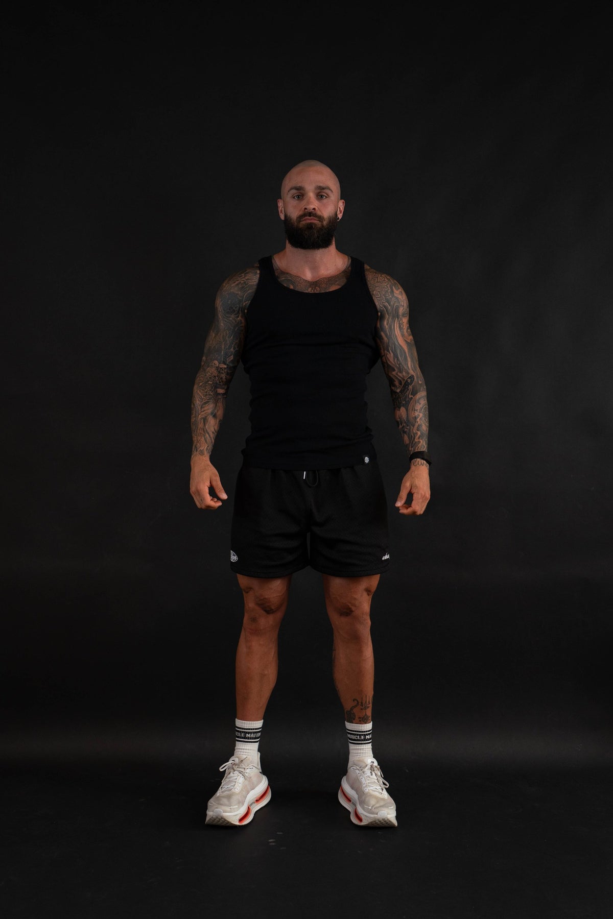 Grit Beater in Black, front view on a male model