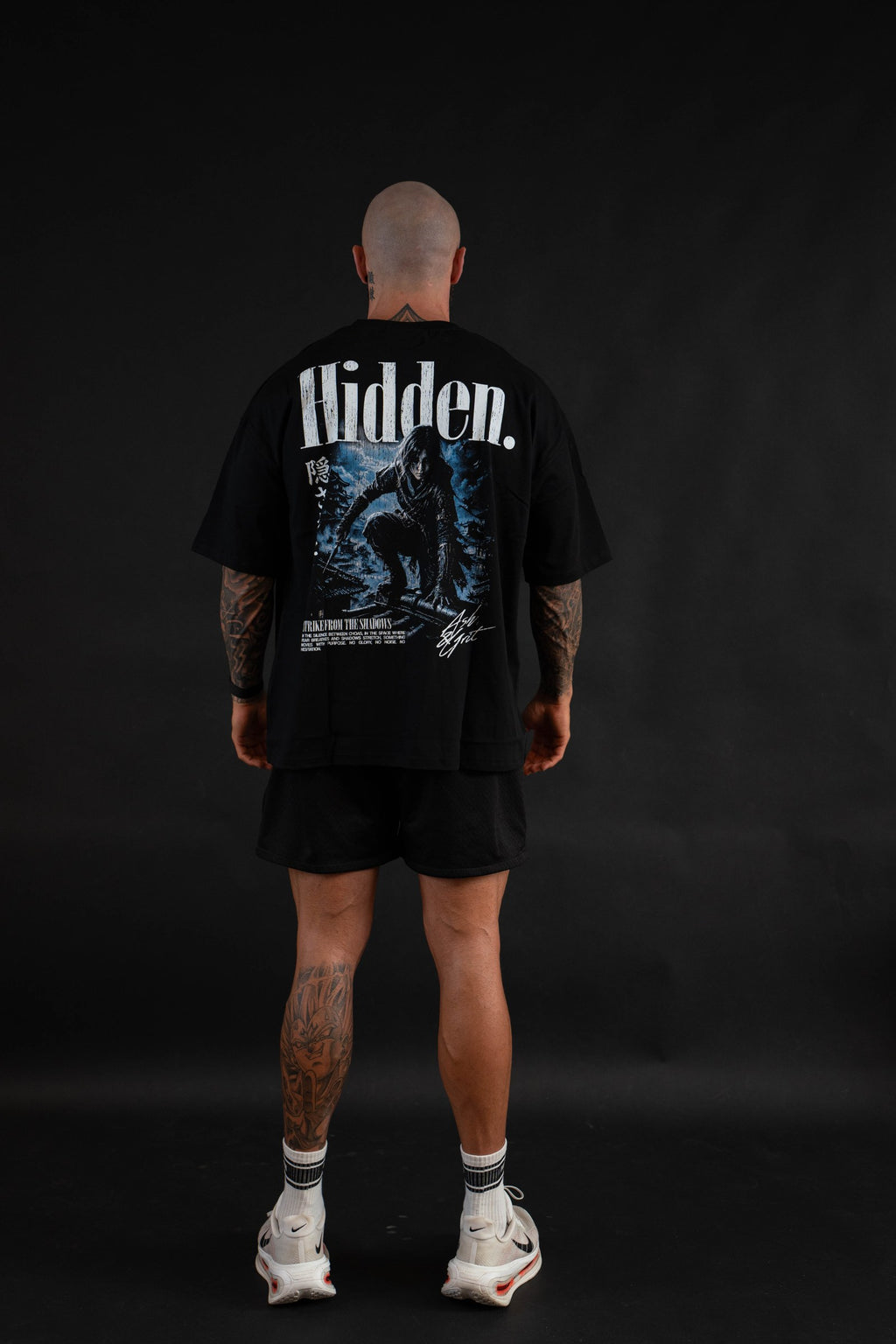 Hidden T-Shirt back graphic on a male model
