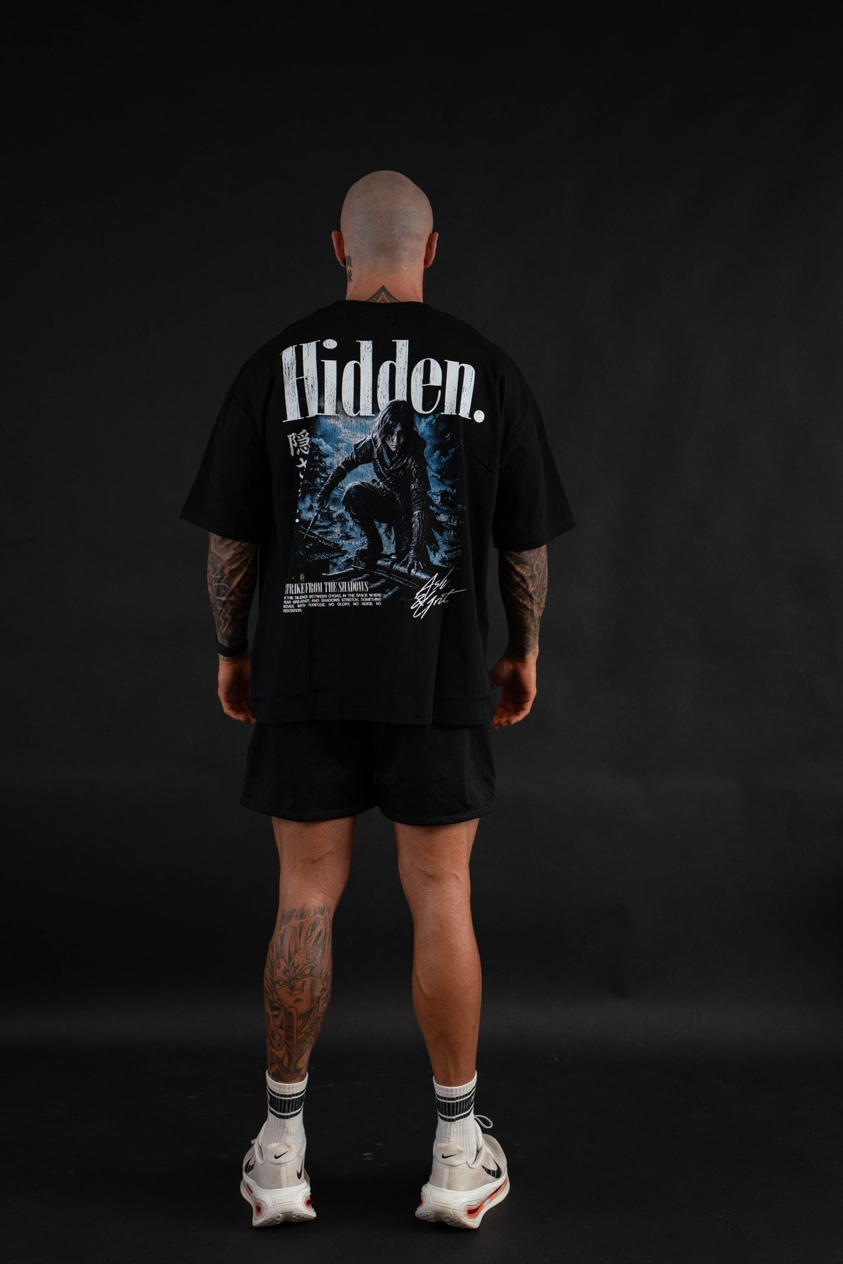 Hidden T-Shirt back graphic on a male model