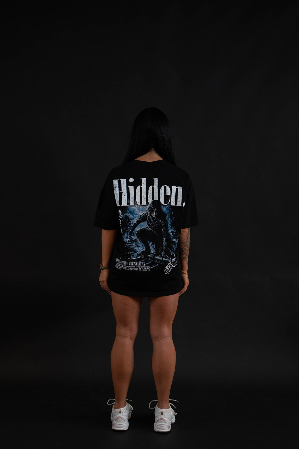 Hidden T-Shirt back graphic on a female model