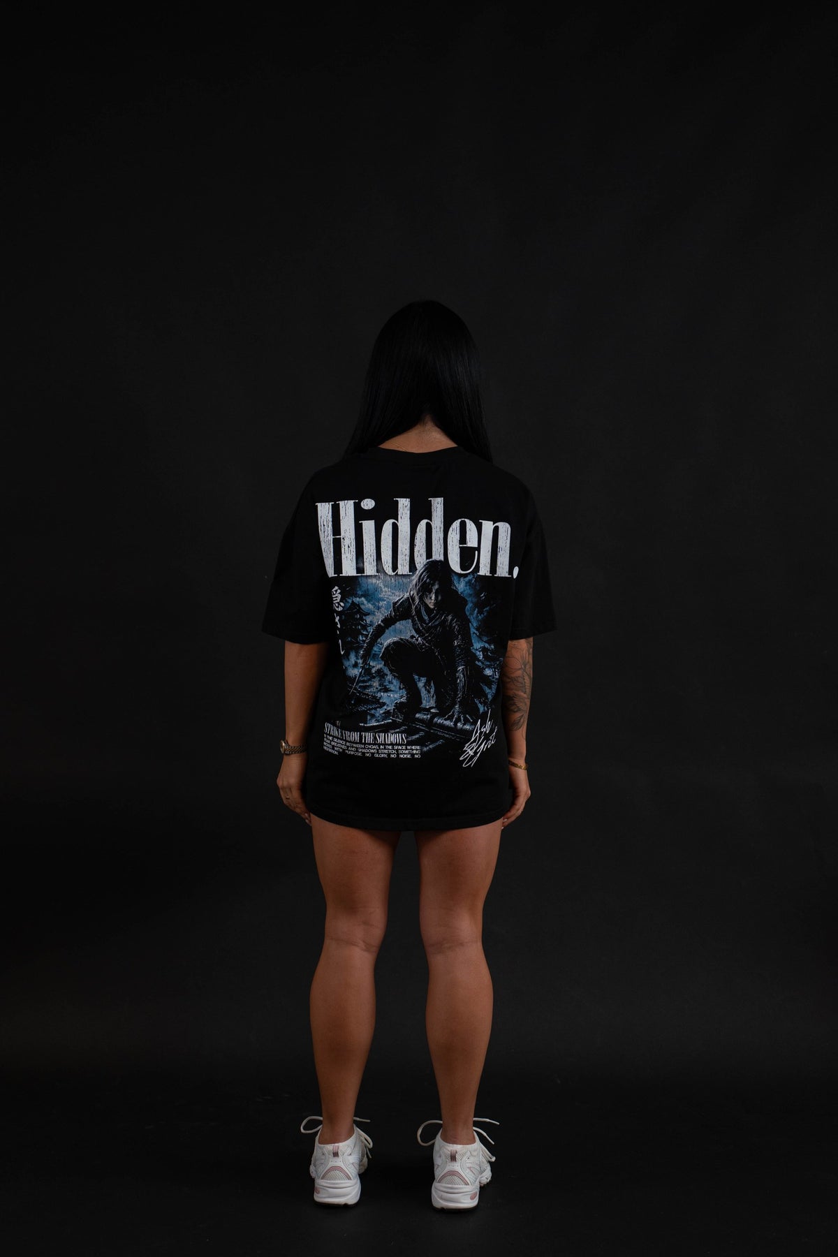 Hidden T-Shirt back graphic on a female model