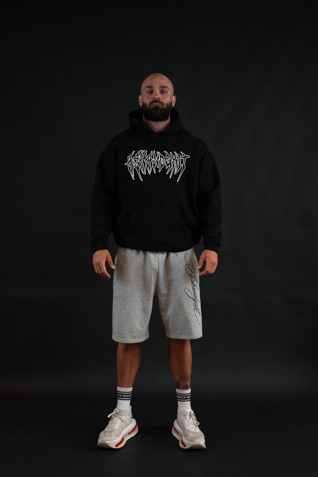 Hollow Hoodie front logo on a male model