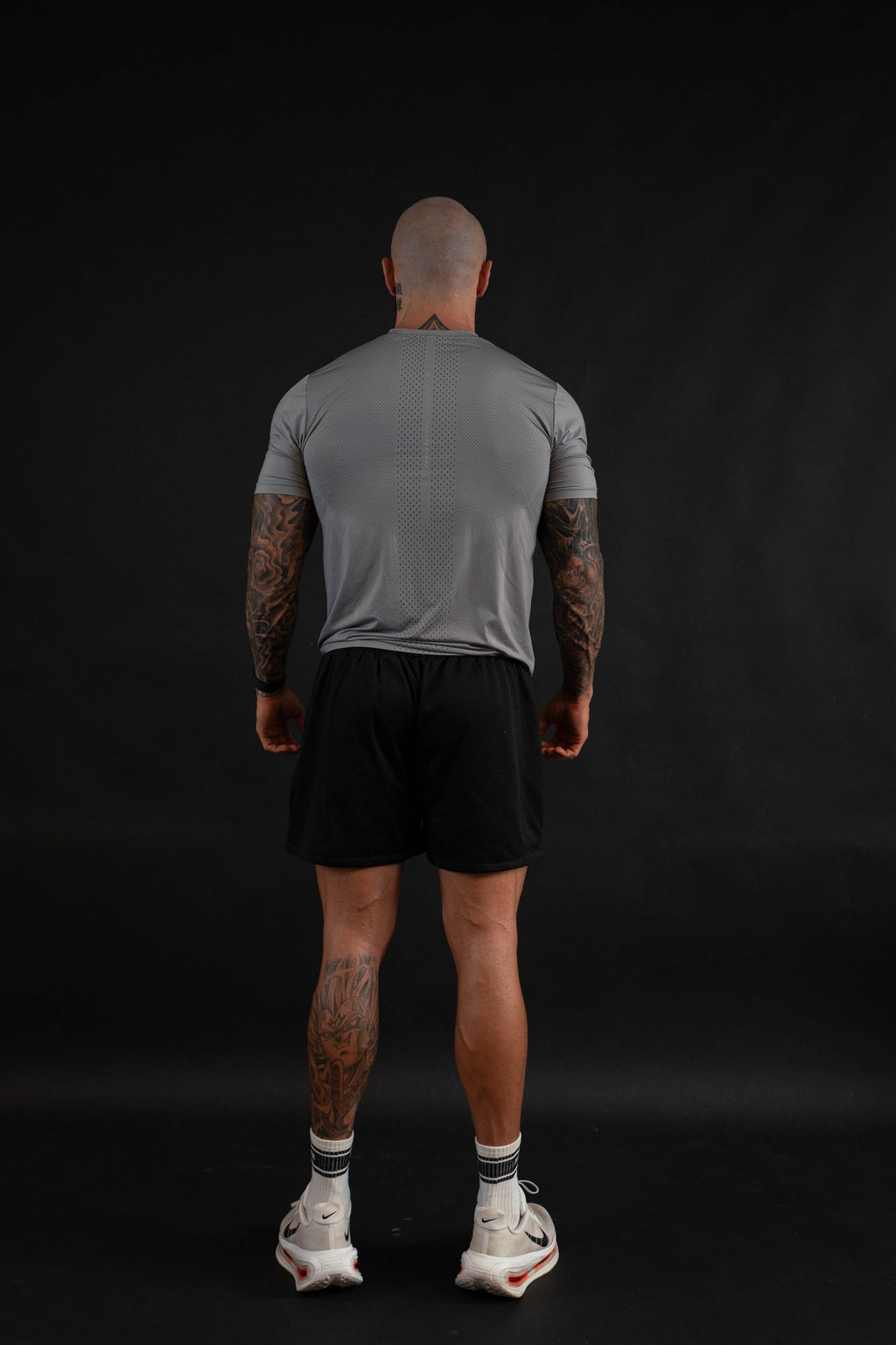 Performance T-Shirt back view on a male model
