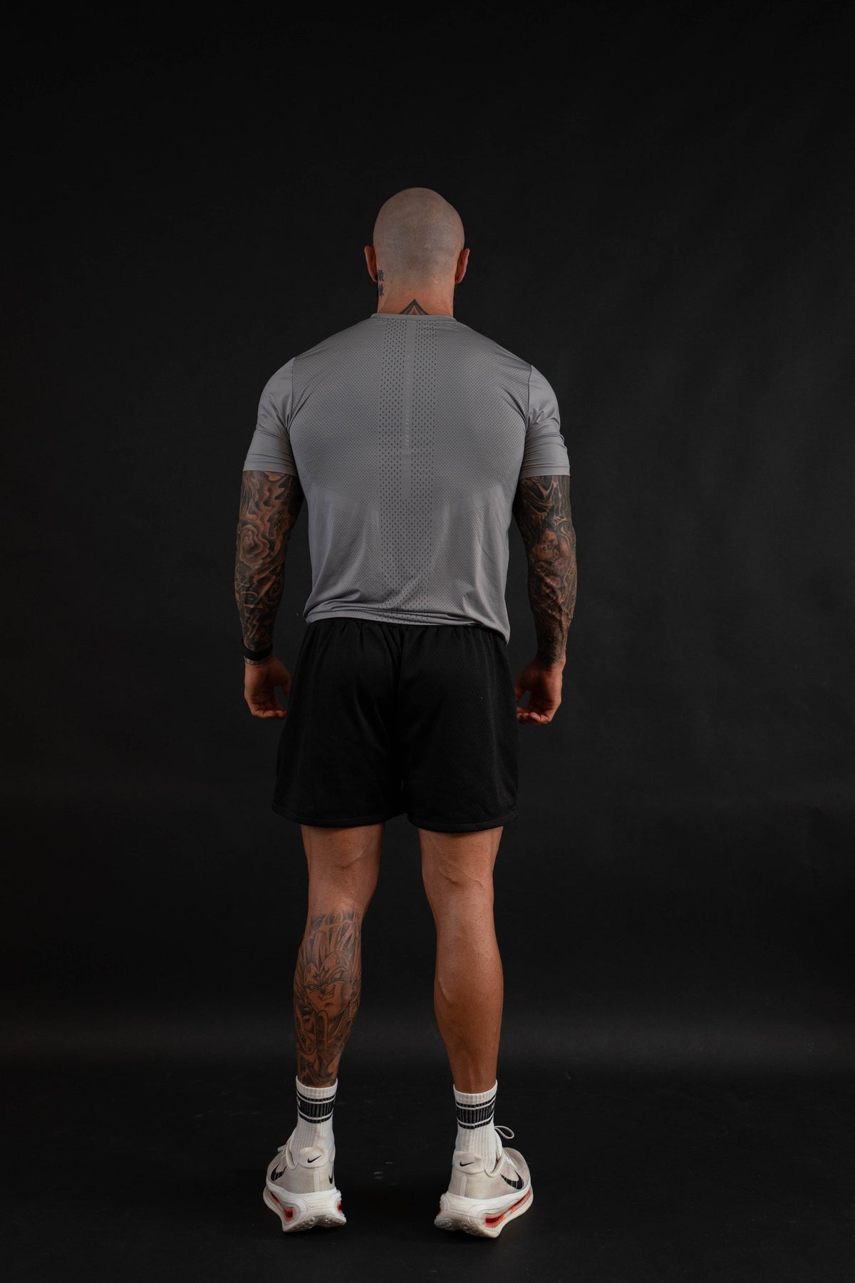 Performance T-Shirt back view on a male model