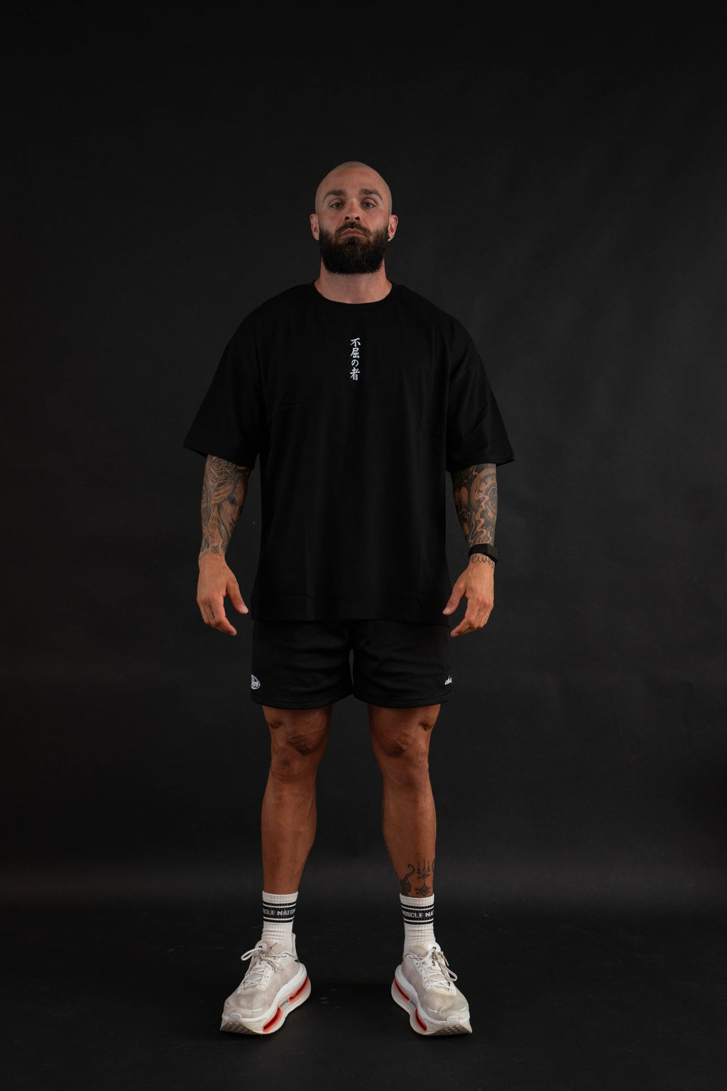 Unyielding T-Shirt front view on a male model