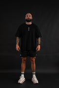 Unyielding T-Shirt front view on a male model