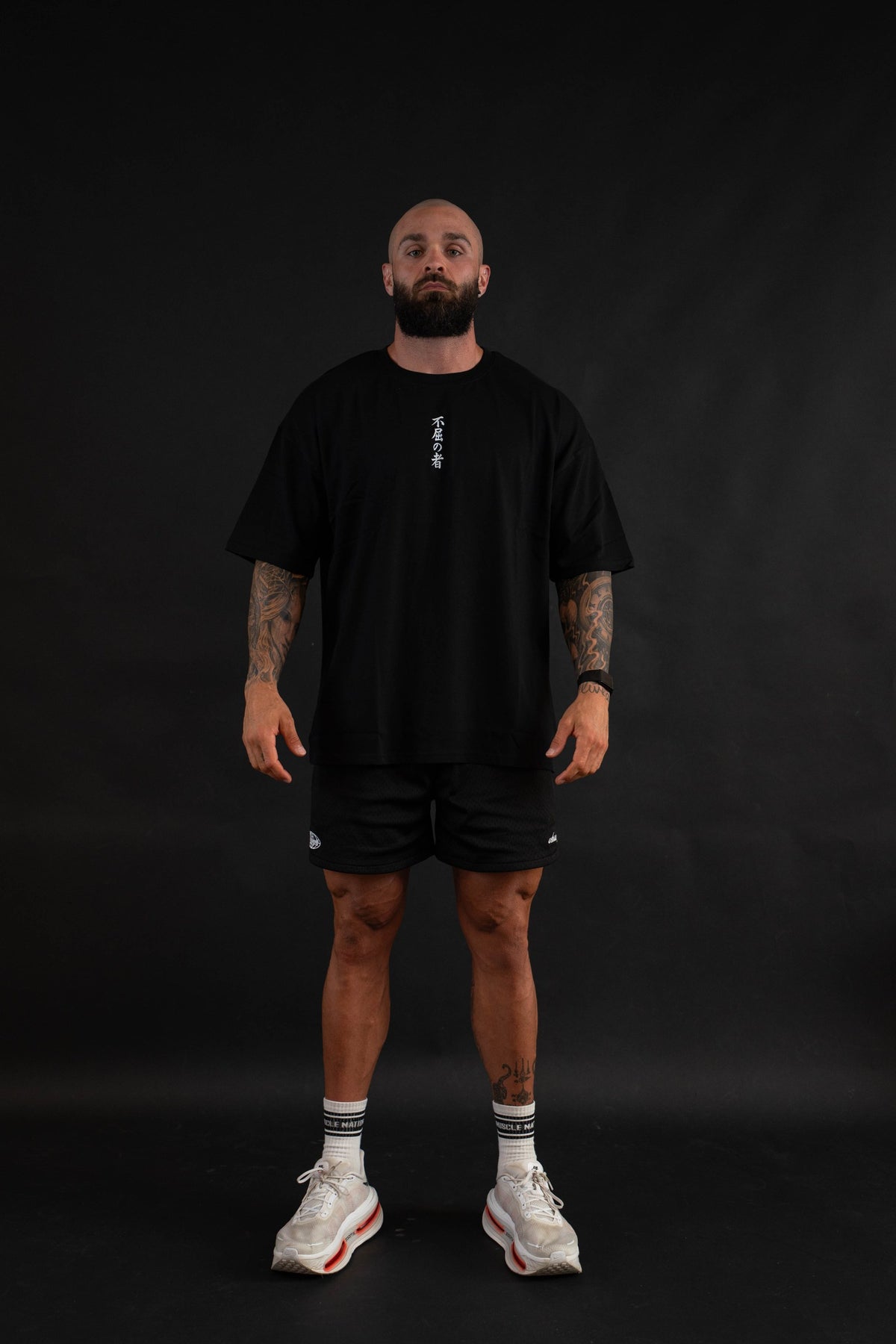 Unyielding T-Shirt front view on a male model