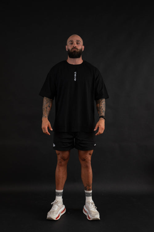Unyielding T-Shirt front view on a male model
